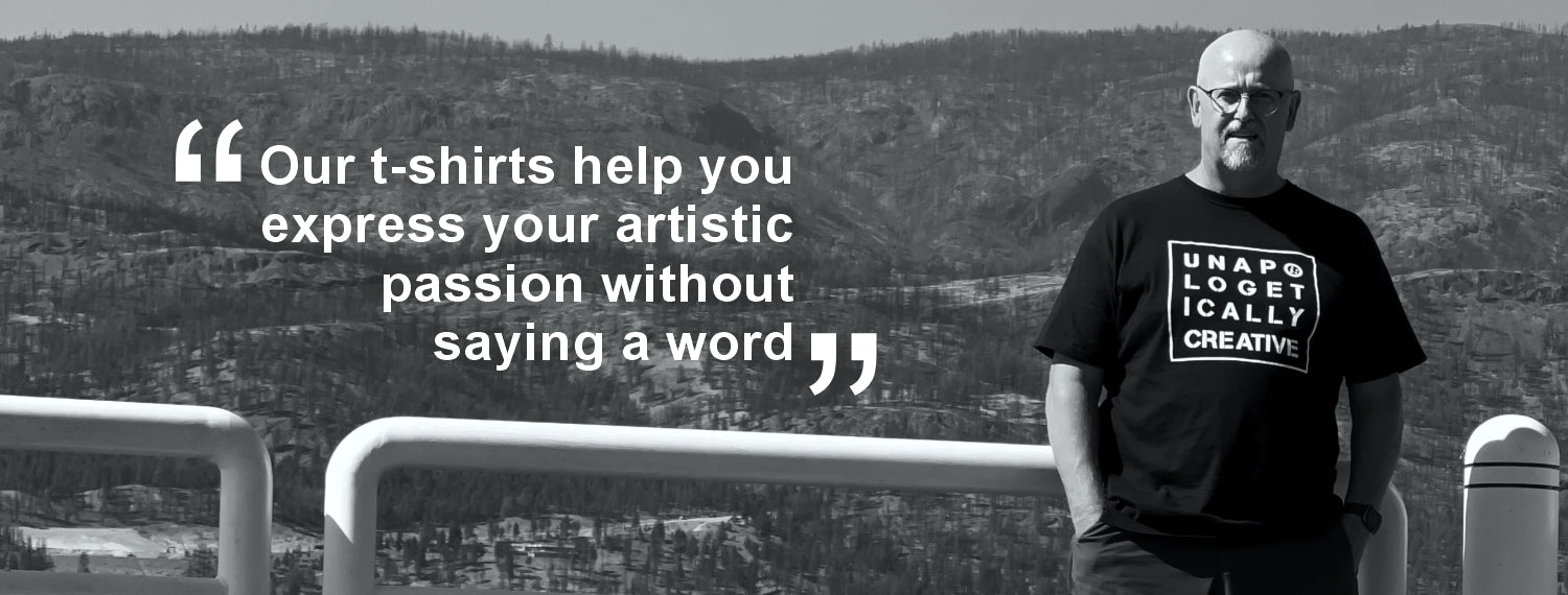 A man wearing a black graphic t-shirt stands outdoors against a hazy mountain background, with a quote overlaid on the left side of the image.